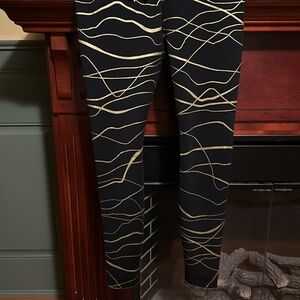 Nike gold and black leggings